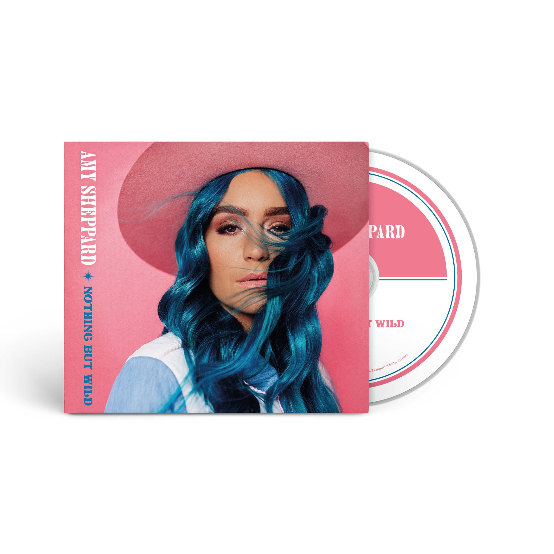 The cover of Amy Sheppard's new EP called Nothing But Wild. An image of a CD is half sticking out of the right hand side. Amy is wearing a blue and white cowboy shirt with her long blue hair and a pink cowboy hat.