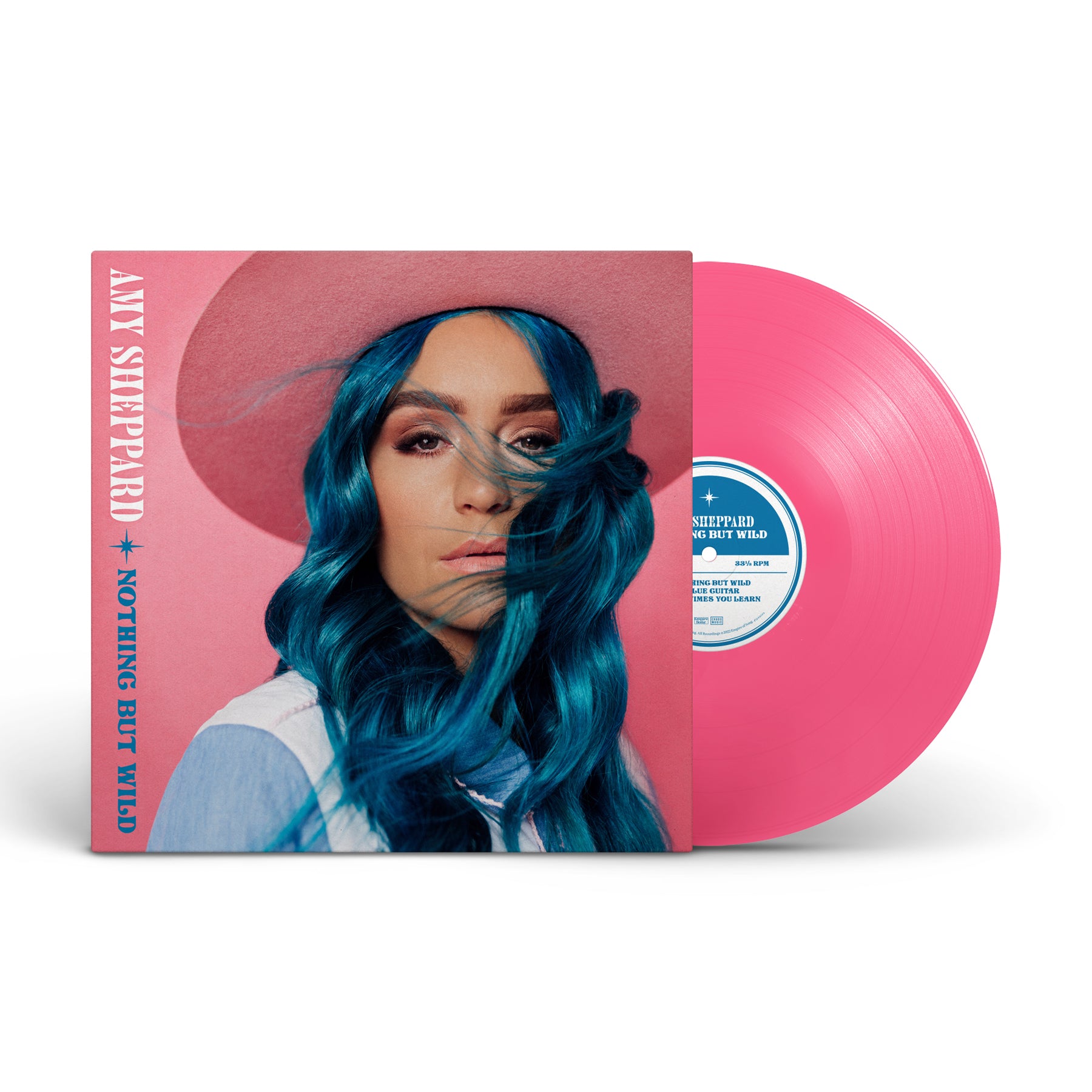 The cover of Amy Sheppard's new EP called Nothing But Wild. An image of a pink vinyl record is half sticking out of the right hand side. Amy is wearing a blue and white cowboy shirt with her long blue hair and a pink cowboy hat.